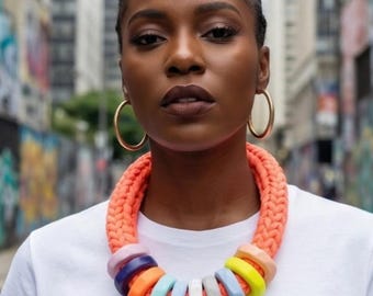 Orange statement necklace; bright, bold jewellery, dopamine dressing
