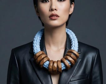 Sculptural necklace made of bronze rings and light blue yarn, modern, unusual statement piece