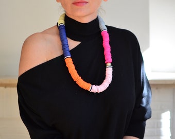 Thick, colourful statement necklace; seed beads, colour block style
