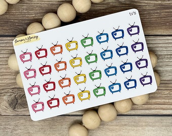 May include: A sheet of colorful TV stickers with a heart in the middle of each TV. The stickers are arranged in rows and columns. The text "tv's" is at the top of the sheet.