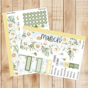 May include: A set of printable planner stickers featuring a floral daisy design with green leaves. The stickers include a calendar, a monthly tracker, a day off tracker, and a set of boxes for notes. The stickers are designed in a light blue and green color scheme with the text "March" in a handwritten font.