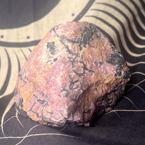 Raw high quality rhodonite crystal specimen
