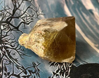 High quality Smokey quartz with rutile point rough cut base