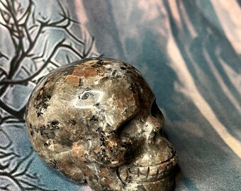 Small yooperlite skull crystal carving