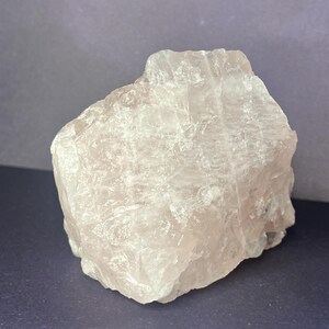 Raw rose quartz crystal specimen