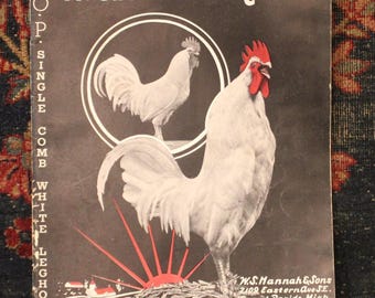 Puede incluir: Anuncio vintage de W.S. Hannah & Sons con un gallo blanco con cresta y barbilla rojas. El texto dice "R.O.P. Single Comb White Leghorns" y "Progeny Tested Male G-607 Sire to Winning Pen."