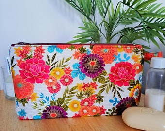 Colourful and bright floral design handmade fabric wash bag. 27cm (10.5") x 15cm (6")