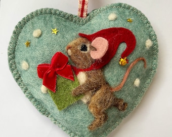 Needle felted Christmas pixie mouse on a felt heart scented with spices, Santa’s helper mouse.