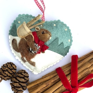 Beaver Holiday decoration - wool hanging heart with 3d felt beaver collecting wood
