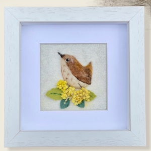 Jenny Wren arranged on leaves with real dried flowers, felted bird diorama framed picture