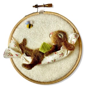 Needle felted sleeping Rabbit embroidery hoop wall art . Resting in her hammock sweet needle felted rabbit sculpture in an embroidery hoop.