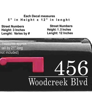May include: Black mailbox with a red flag and handle. The mailbox displays the address "456 Woodcreek Blvd" in white lettering. Text on the image indicates decal measurements and street number sizes.