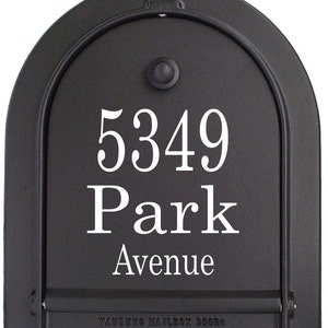 May include: Black mailbox door with the address "5349 Park Avenue" in white lettering. The mailbox door has a rounded top and a hinged bottom. The manufacturer's information is printed at the bottom.