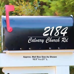 May include: Black mailbox with white lettering displaying the address "2184 Calvary Church Rd." A red flag is raised. Approximate mailbox size is 10.5" high and 21" long.