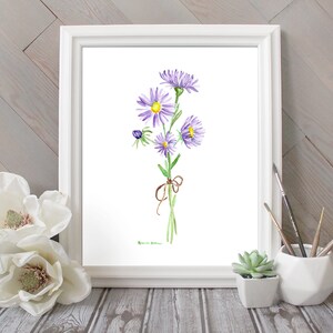 May include: A watercolor painting of a bouquet of purple flowers with a brown ribbon tied around the stems. The flowers are on a white background.