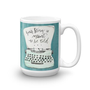 May include: White ceramic mug with a teal blue background featuring a vintage typewriter with the text "Your story is meant to be told".