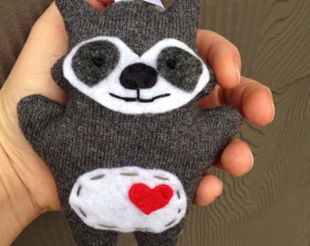 Raccoon ornament from recycled materials