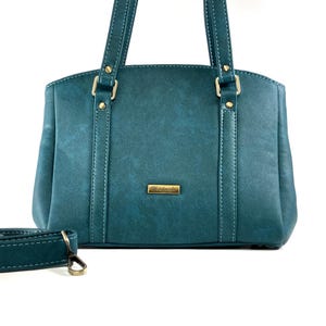 Bolso de hombro verde azulado: elegante diseño con cremallera en la parte superior