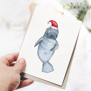 Seekuh in der Weihnachtsmütze Weihnachtskarte / Weihnachtskarten / Tropisches Weihnachten / Frohe Weihnachten / Seekuh / Santa / Santa Hat / Frohe Weihnachten