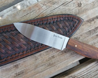 Sandstorm, a drop point bird's head knife.