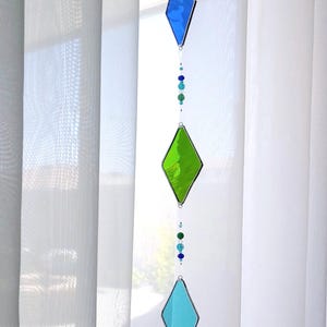 Long Sun Catcher Choice of Colors Purples, Blues, Teal, 24 inch long Stained Glass Beautifully Embellished Glass Beads Hanger Ready to Hang
