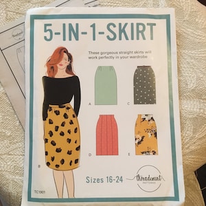 May include: A sewing pattern titled "5-IN-1-SKIRT" featuring illustrations of five different skirt styles. The pattern includes sizes 16-24 and showcases a woman wearing a leopard print skirt. The brand name "threadcount PATTERNS" is also visible.
