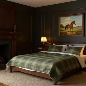 May include: A bedroom featuring a wooden bed frame with a green and tan plaid comforter and two matching pillows. A fireplace with a burning fire is on the left, and a framed painting of a brown horse in a field hangs on the dark green wall.