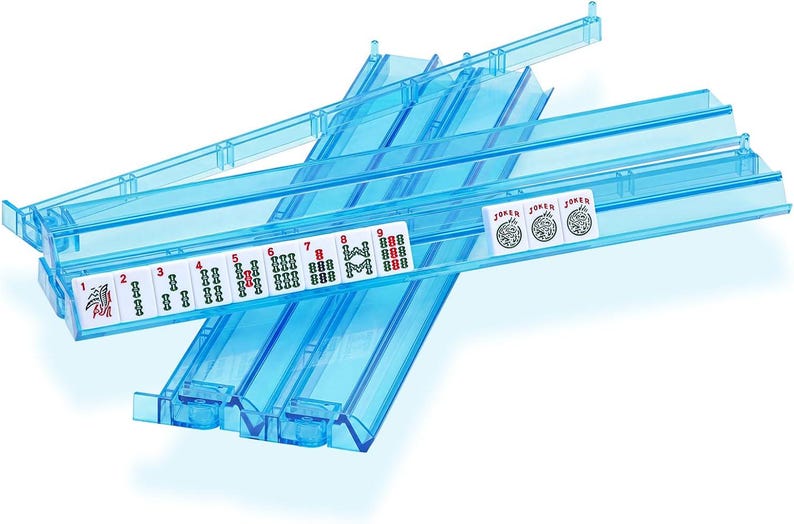 May include: Two translucent blue plastic Mahjong tile racks arranged in a cross pattern. The front rack holds a sequence of white tiles numbered one through nine in red and green, followed by three white tiles labeled Joker with a graphic icon.