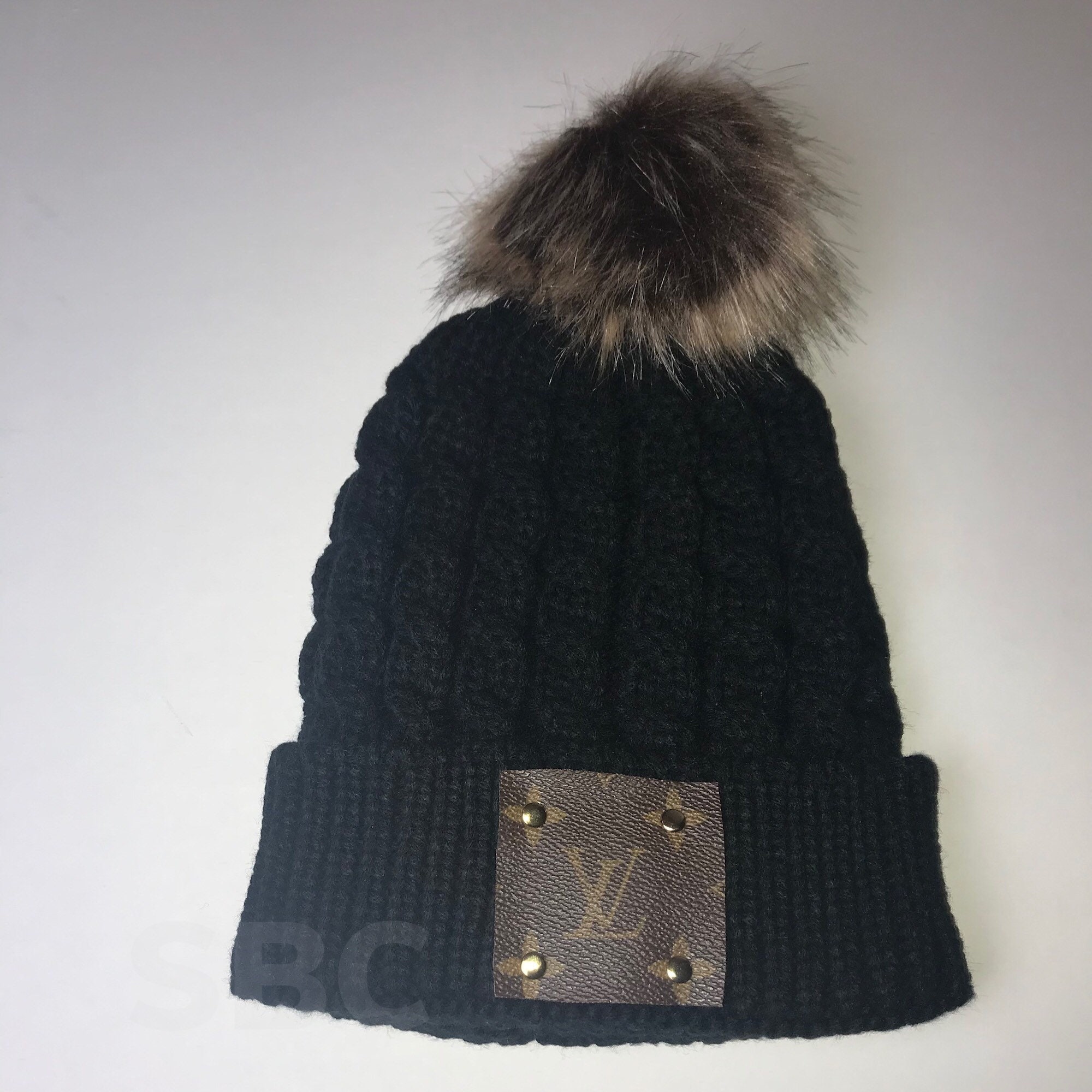 Louis vuitton repurposed pom pom beige beanie with - Depop