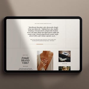 Może przedstawiać: Tablet wyświetlający stronę internetową z białym tłem i czarnym tekstem. Tekst na stronie internetowej brzmi: "Shorthread chocolate cake cheesecake drag&eacute;e icing marzipan pie. Topping bear clam tiramisu croissant pastry drag&eacute;e Jelly honέ&sigma;&alpha; sweet roll sagar plum marzipan pastry apple pie candy icing. Danish gingerbread sesame sp dessert jelly wafer donat cupcake weet..." i "What's Your Female Brand Vibe?"