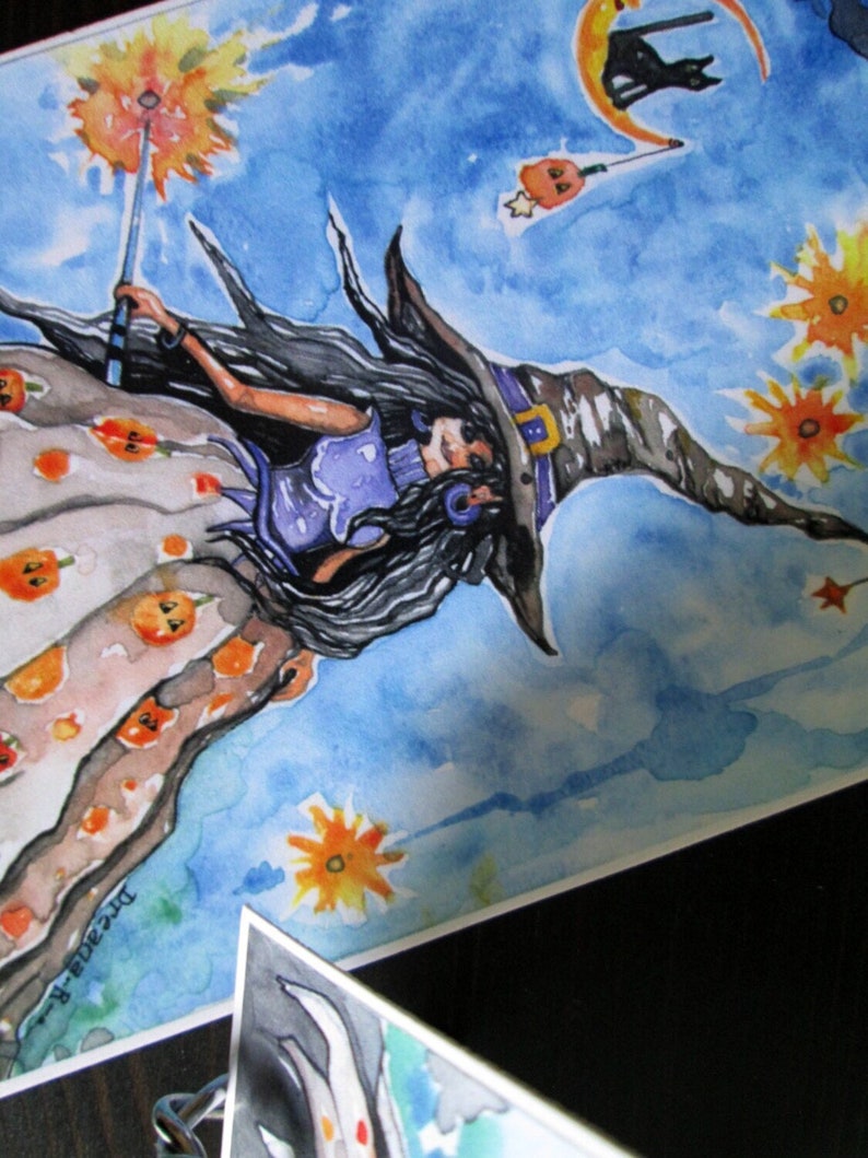 May include: A watercolor painting of a witch flying through the air with a wand in her hand. She is wearing a purple dress and a brown hat with a buckle. The background is a blue sky with clouds and stars.