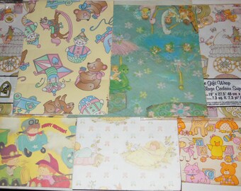 May include: Assortment of vintage wrapping paper featuring various designs, including a clown, a teddy bear, a baby in a crib, and a child on a swing. The paper is printed on a light yellow, light blue, and white background.