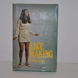 May include: A vintage book cover with a woman wearing a white lace dress and yellow shoes. The book title is "Lace Making" by Eunice Close.
