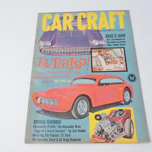 May include: Vintage "Car Craft" magazine cover featuring illustrations of classic cars, including a red El Torro model. The cover has a blue and yellow color scheme with text and graphics.