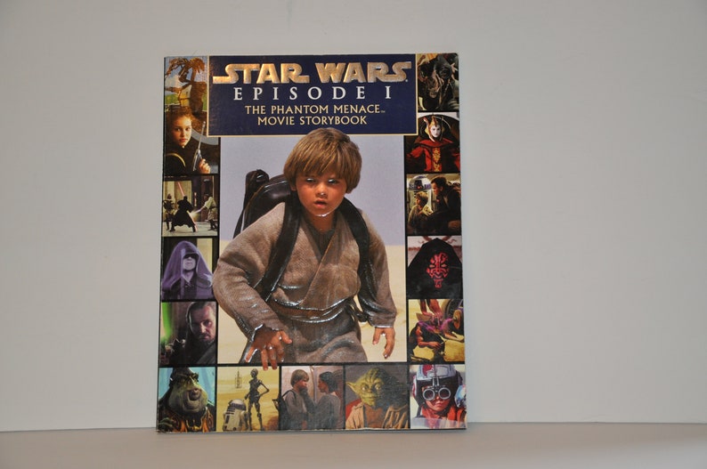 May include: A Star Wars Episode I: The Phantom Menace movie storybook with a collage of images from the film on the cover. The cover features a young boy in a brown robe, a green alien, and a red-haired woman.