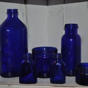 7 Vintage Kobaltblau Medizinflaschen Glasflasche Lot Bild 1
