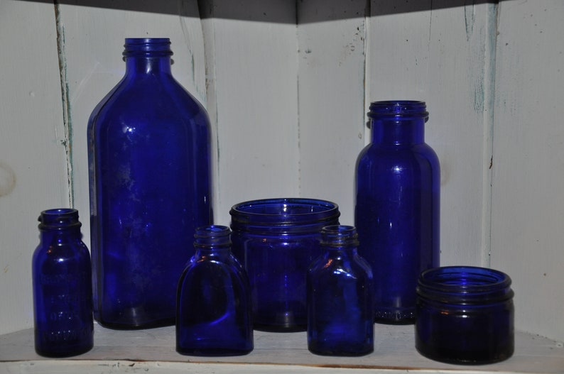 7 Vintage Kobaltblau Medizinflaschen Glasflasche Lot Bild 1