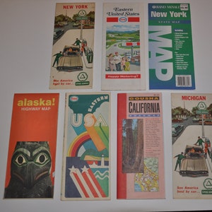May include: A collection of vintage road maps from the Eastern United States, Alaska, California, Michigan, and New York. The maps are all in a similar style, with a red, white, and blue colour scheme and a logo for the Citgo Service.