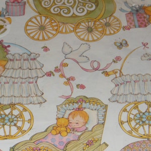 May include: A white and pink baby carriage with a white lace trim and a pink ribbon. The carriage is decorated with flowers and a small teddy bear. The carriage is on a white background with a pink and blue border. The text "Made in Canada" is printed on the image.