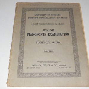 May include: A vintage book cover for a Junior Piano Examination Technical Work book. The cover is beige with black text and a decorative border. The text reads "University of Toronto, Toronto Conservatory of Music, Local Examinations in Music, Junior Pianoforte Examination, Technical Work, Price $2.5, Whaley, Royce & Co., Limited, 237 Yonge Street, Toronto, Can."