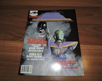 Puede incluir: Una portada de la revista Star Wars Insider con Darth Vader y un personaje alienígena verde. El texto de la portada de la revista dice "Star Wars Shadows of the Empire".