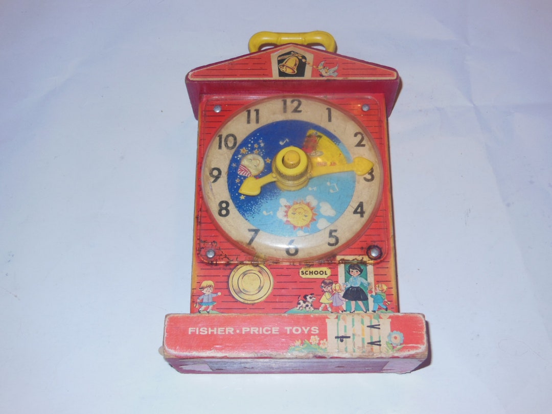 Fisher Priceフィッシャープライス ティーチングクロック　アンティーク Amazon.com: Fisher Price Classic Teaching Clock : Toys & Games