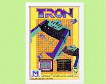 1983 Tron Atari 2600 Authentic Mattel Electronics Vintage Video Game Cartridge Advertisement