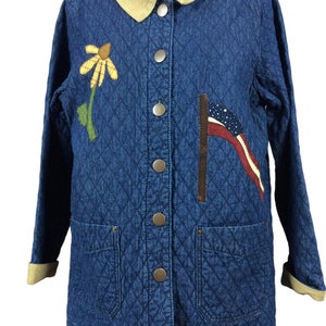 Broderad flagga och vattenkanna quiltad jeansjacka