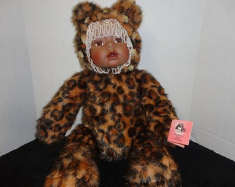 African DOLL by TRADITIONS DOLL Co - Leopard Bear African Doll - number S16247b - Retired Porcelain Faced Doll