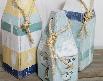 Three buoy pained buoy tabletop set - hand painted with sea glass colors - small buoy has cute running sandpipers