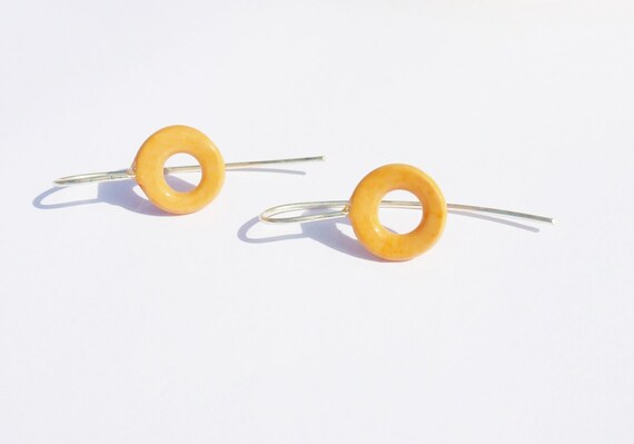 Earrings: handmade open slice bead, orange