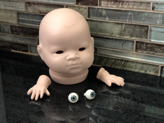 creepy baby doll head