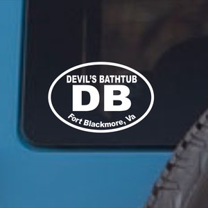 May include: White oval sticker with the text "Devil's Bathtub DB Fort Blackmore, Va" on a blue car.