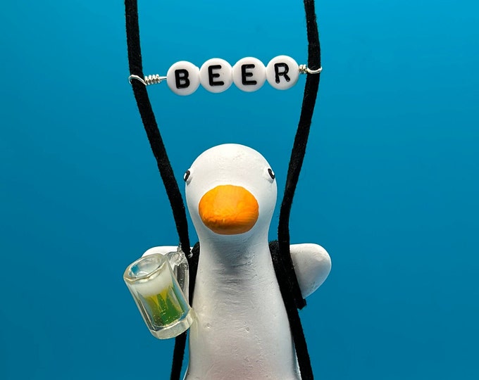 ducks, duck, duck it, rubber ducks, dangler, rearview mirror dangler, car accessory, beer, party duck, get ducked, got ducked, beer duck